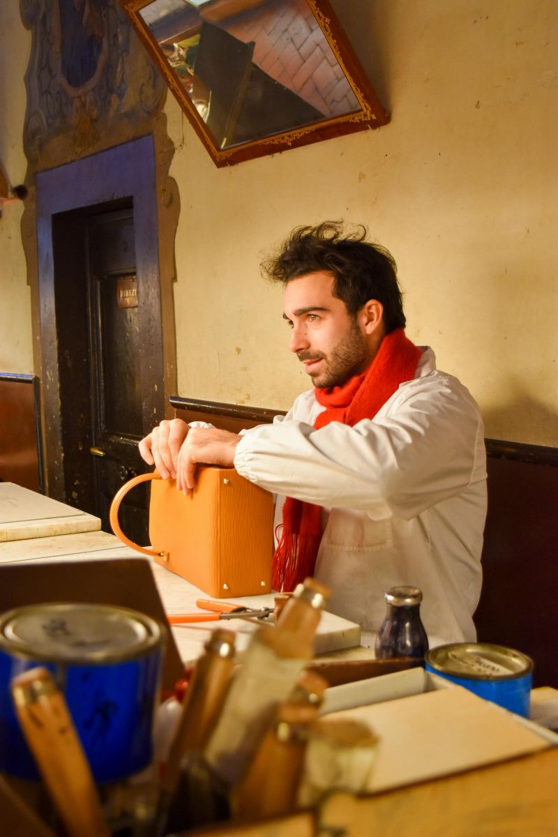 Leather craftsman, Scuola del Cuoio, Santa Croce, Florence - by Gwendolyn Stansbury