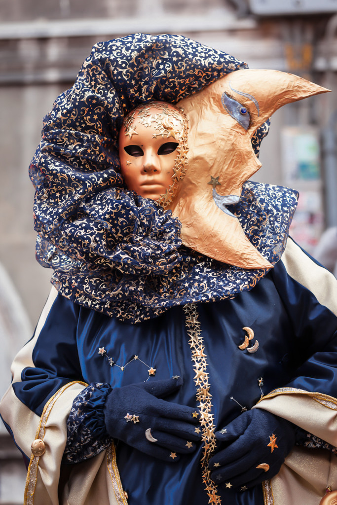 a costumed character at venice carnival